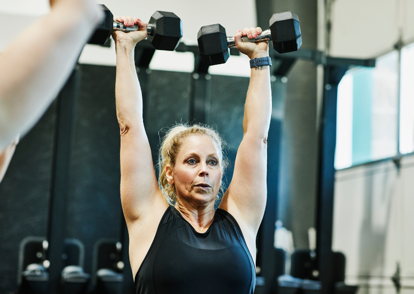 woman doing dumbbell overhead press
5 Day Dumbbell Workout