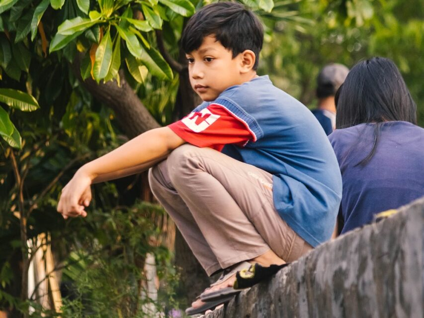 boy doing asian squat