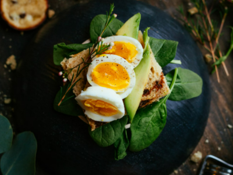 A small portion of bread and hard boiled egg.